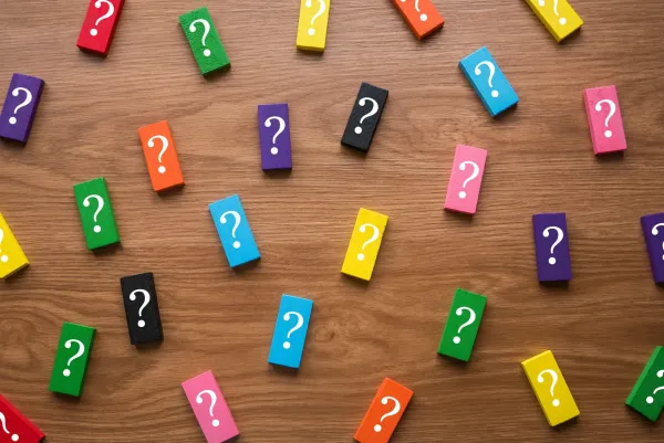 a-colorful-wooden-block-with-a-symbol-of-question-2026-03-16-22-39-38-utc1-69ce72abb9a5c