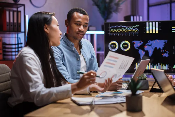 african-man-and-asian-woman-having-paperwork-at-of-2026-03-16-02-46-33-utc1-69ce6c44d0274