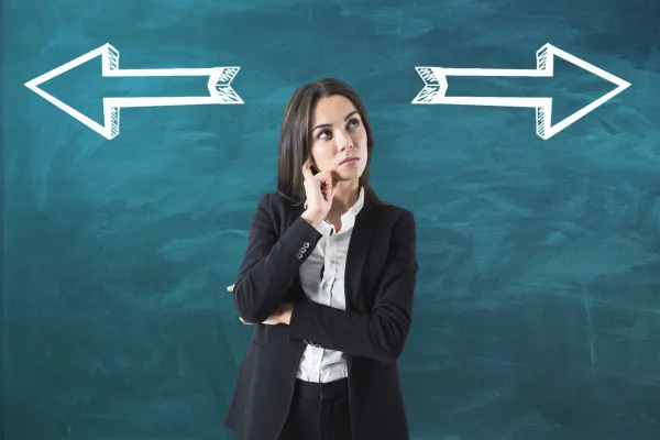 businesswoman-standing-thinking-back-facing-the-gr-2026-01-11-08-48-42-utc1-69ce75c9cc814